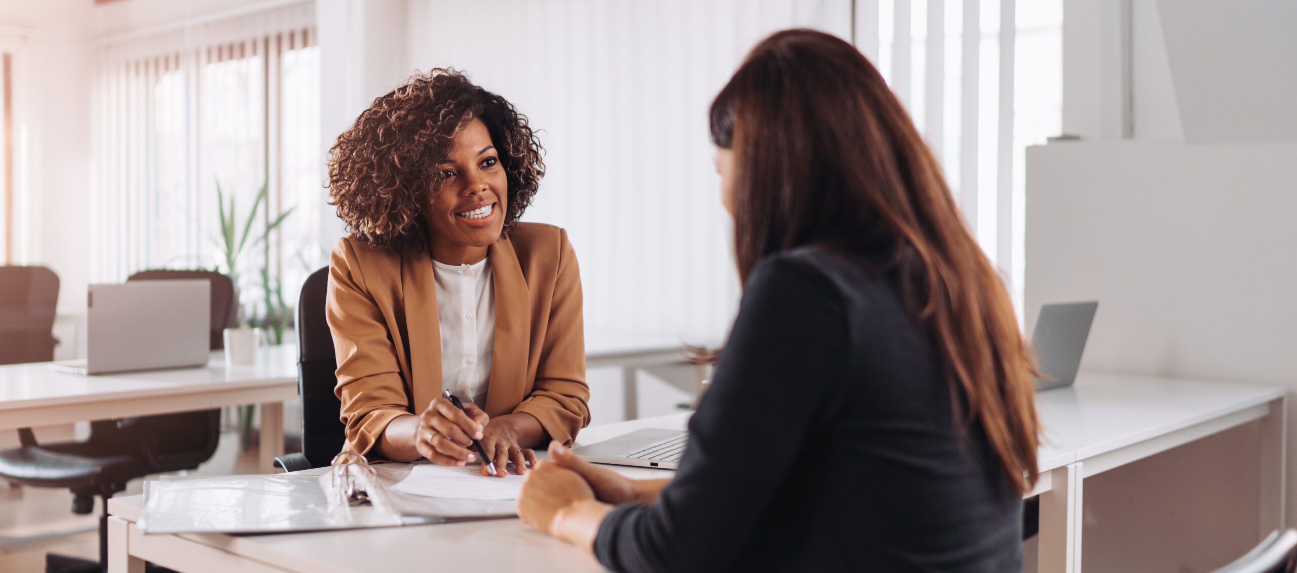 Customer consulting with bank advisor/officer