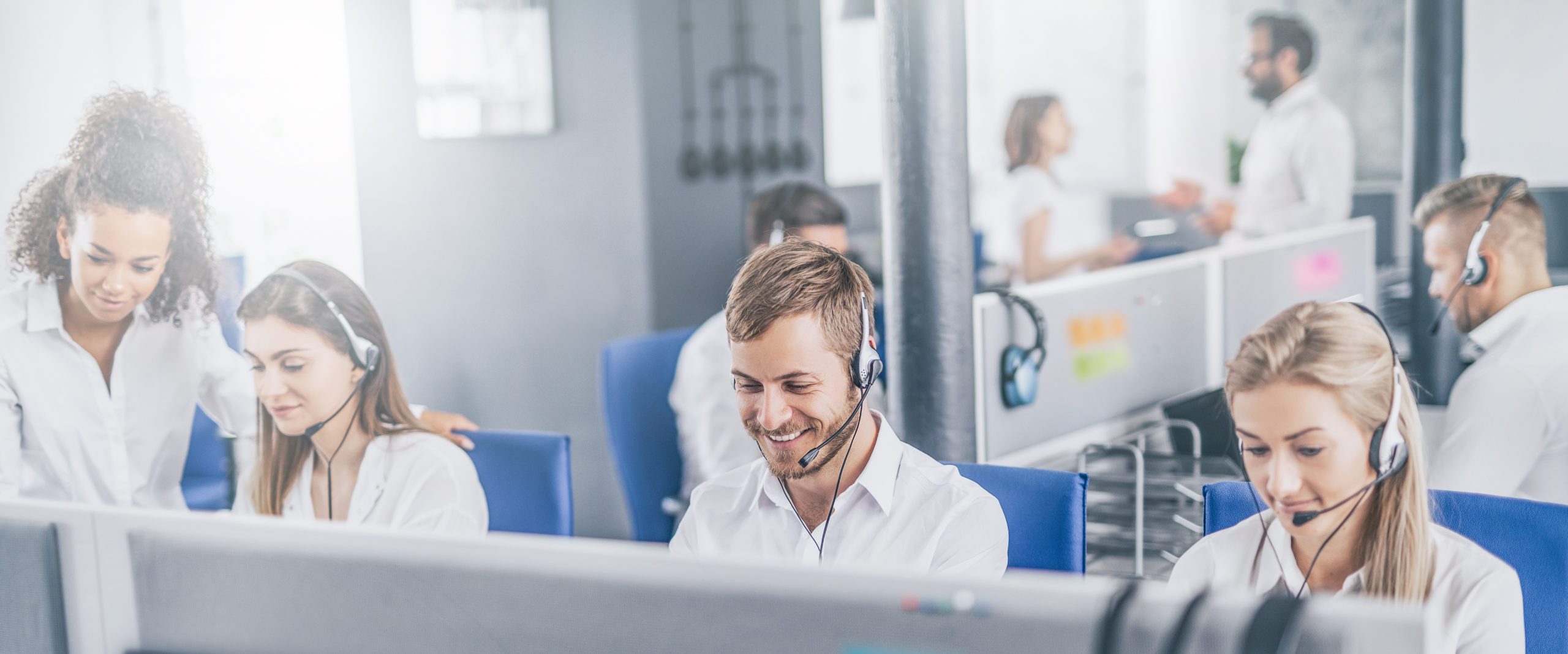 Call center with happy customer service team