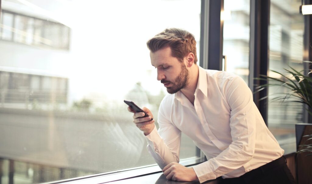 Customer looking at survey questions on phone